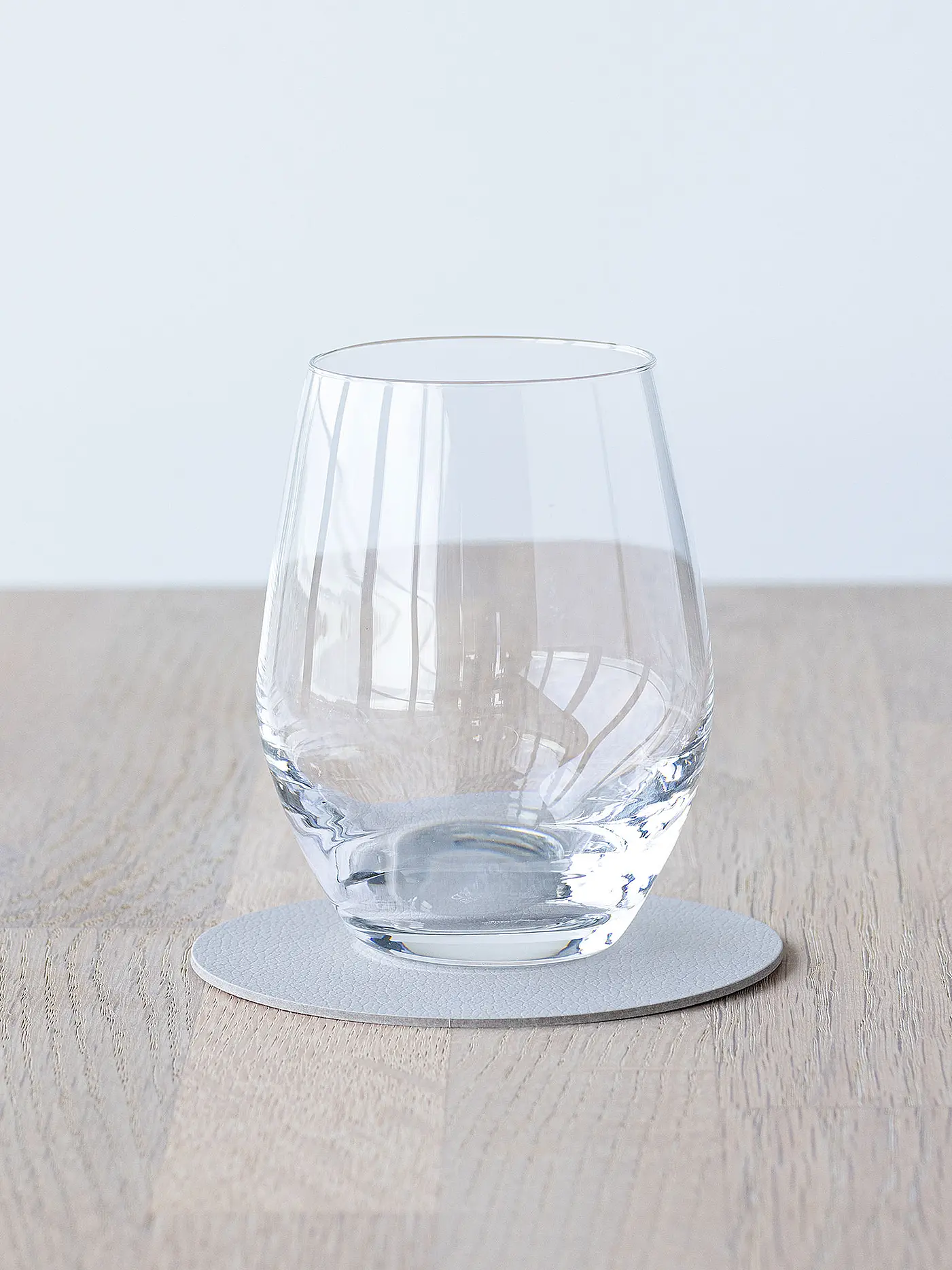 LIND DNA | Leder Untersetzer rund 10cm Oyster White | 